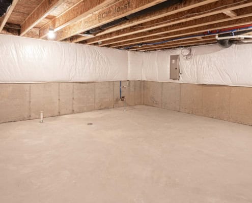 Encapsulated crawl space with dehumidifier, wrapped piers and insulated walls