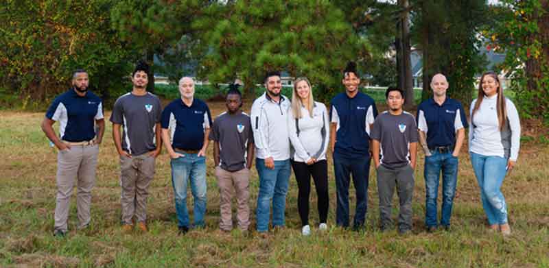 Photo of part of the Elite Moisture Solutions team