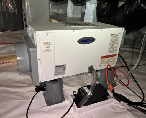 Dehumidifier installed at Mills Lake Wynd crawlspace encapsulation in Holly Springs