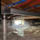 steel support beam with smart jack for foundation repair project on Rippling Stream Rd in Durham