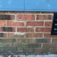 stairstep cracking found along exterior wall during inspection in Apex